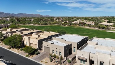 Nestled on a premium golf course lot within the exclusive gated - photo 1