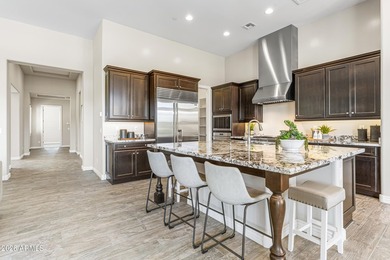 Nestled on a premium golf course lot within the exclusive gated - photo 8
