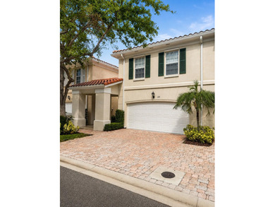 Nestled in the highly sought after Tequesta Oaks community, this - photo 2