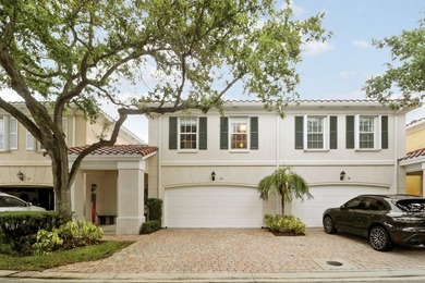 Nestled in the highly sought after Tequesta Oaks community, this - photo 3