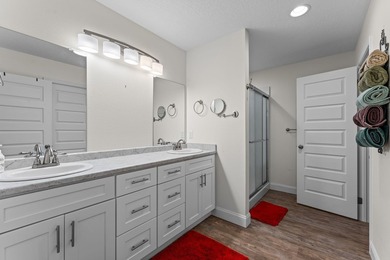 In town convenience with the comfort of main level living awaits