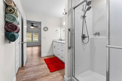 In town convenience with the comfort of main level living awaits