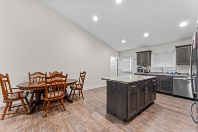 In town convenience with the comfort of main level living awaits