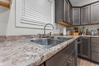 In town convenience with the comfort of main level living awaits