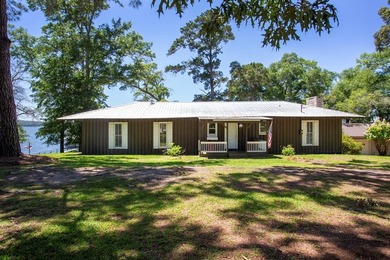 Experience waterfront living at its finest at 64 Poya Point on - photo 5