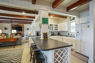 Experience waterfront living at its finest at 64 Poya Point on - photo 10