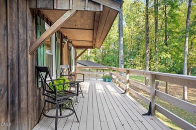 Set on a stunning, private one-acre lot, this three-bedroom