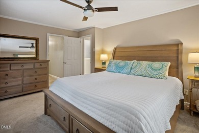 Set on a stunning, private one-acre lot, this three-bedroom