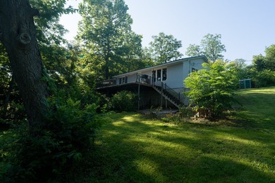 Welcome to your own retreat! Nestled on 1.25 wooded acres in - photo 20