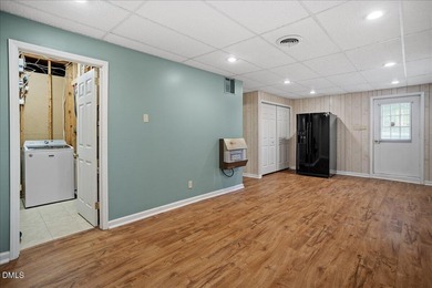 Set on a stunning, private one-acre lot, this three-bedroom