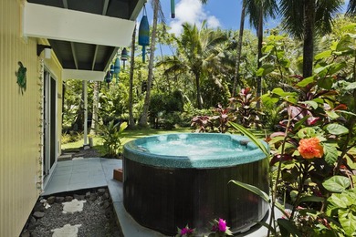 Wake up to sweeping Pacific Ocean views, tropical gardens, and - photo 6