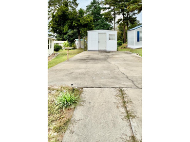 Vacant lot located in the highly sought-after Whispering Pines - photo 1
