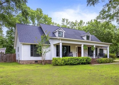 You will be AMAZED by the renovations, upgrades, and extras in - photo 1
