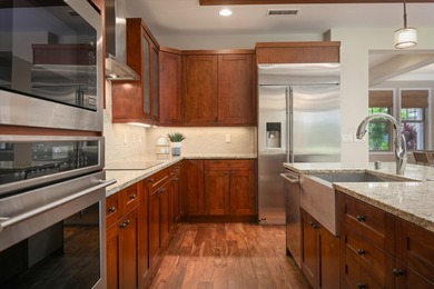 Nestled within an exclusive gated Keauhou community, this - photo 9