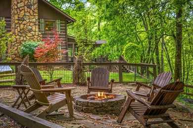 Tucked away on 3.3 acres of private, wooded serenity along 550 - photo 3