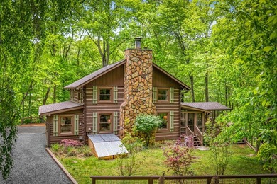 Tucked away on 3.3 acres of private, wooded serenity along 550 - photo 5