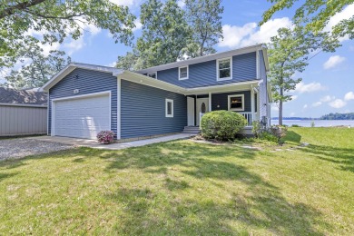 Big Portage Lake Home For Sale in Munith Michigan