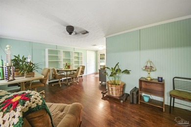 This spacious POOL home is positioned on NEARLY AN ACRE in the - photo 12