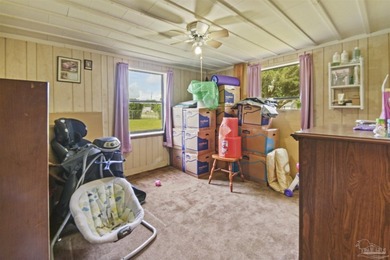 This spacious POOL home is positioned on NEARLY AN ACRE in the - photo 15