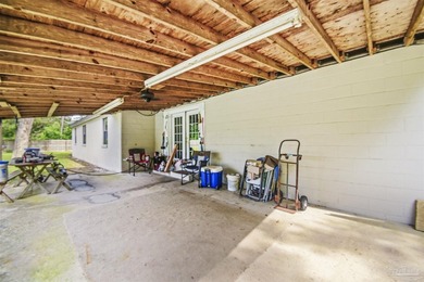 This spacious POOL home is positioned on NEARLY AN ACRE in the - photo 18
