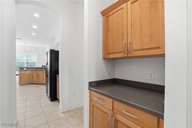 Located in the gated community of Emerson Square, this 3-bedroom - photo 12
