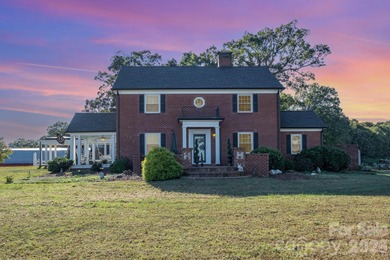 Beautifully remodeled home on over an acre, offering the perfect