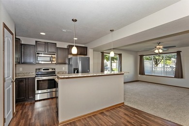 Extremely well maintained 3 bedroom end unit townhome with 2 car - photo 14