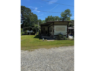 Enjoy the best of lake living with this unique and versatile - photo 1