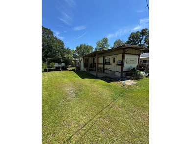Enjoy the best of lake living with this unique and versatile - photo 2