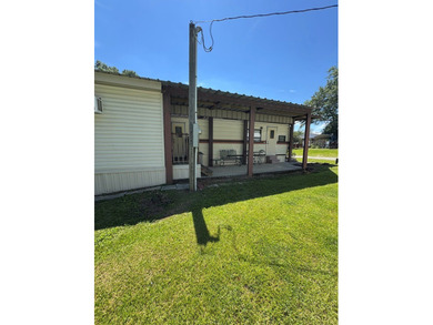 Enjoy the best of lake living with this unique and versatile - photo 5