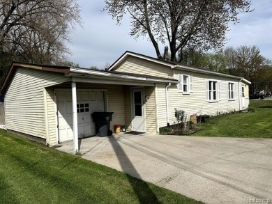 Lake Home For Sale in Harrison Township, Michigan