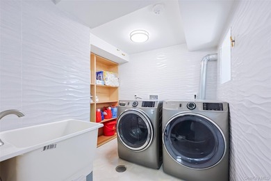 Welcome to this luxury detached two-family residence located in - photo 14