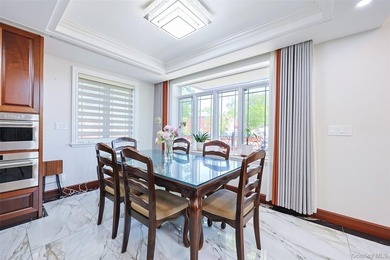 Welcome to this luxury detached two-family residence located in - photo 18