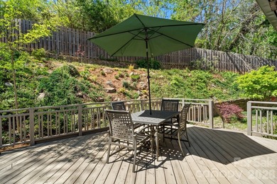 Tucked away among beautiful blooming perennials in Asheville's - photo 22