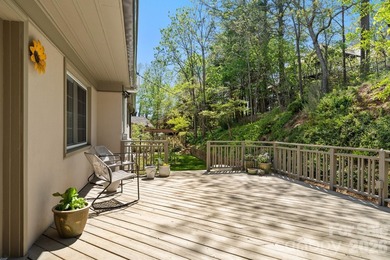 Tucked away among beautiful blooming perennials in Asheville's - photo 23