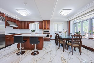 Welcome to this luxury detached two-family residence located in - photo 23