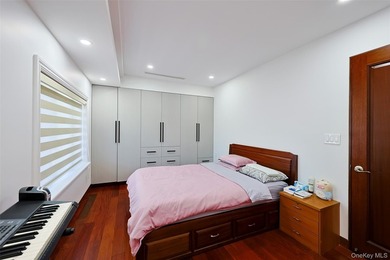 Welcome to this luxury detached two-family residence located in - photo 42