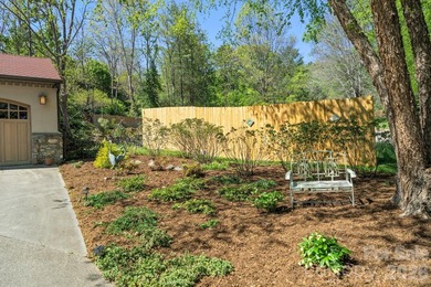 Tucked away among beautiful blooming perennials in Asheville's - photo 44