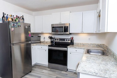 This charming home features updated kitchen and bathrooms with - photo 6