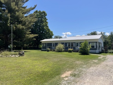 Lake Home For Sale in Onaway, Michigan