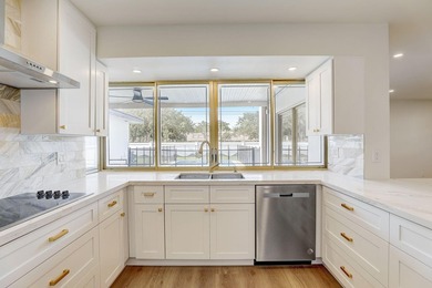 WOW! This incredible 5-bedroom, 3-bathroom pool home has been - photo 4
