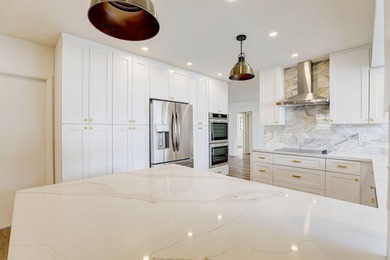 WOW! This incredible 5-bedroom, 3-bathroom pool home has been - photo 5