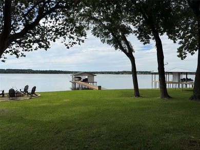 Enjoy incredible open-water living with 100 feet of shoreline - photo 2
