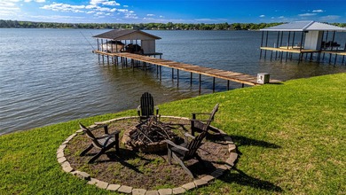Enjoy incredible open-water living with 100 feet of shoreline - photo 3