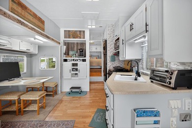 Check out this property! Super well kept RV with a large - photo 17