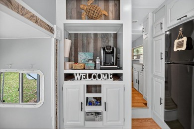 Check out this property! Super well kept RV with a large - photo 18