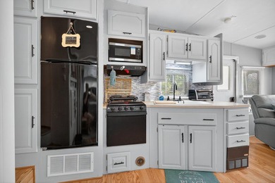 Check out this property! Super well kept RV with a large - photo 19