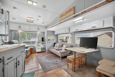 Check out this property! Super well kept RV with a large - photo 20