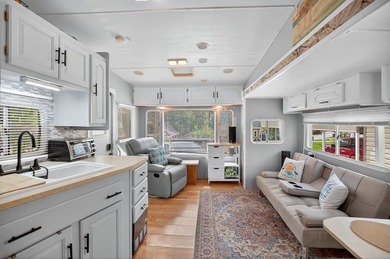 Check out this property! Super well kept RV with a large - photo 21