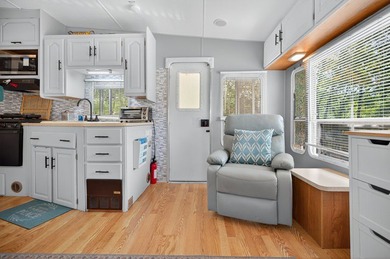 Check out this property! Super well kept RV with a large - photo 25